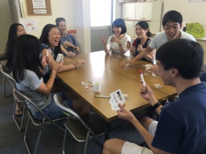 Fun playing "spoons" with pens at the JS group meeting ( similar to our FNF). There were over 16 youth attending from Suita. 