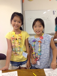 "Kawaii" girls wearing their handmade leis. 